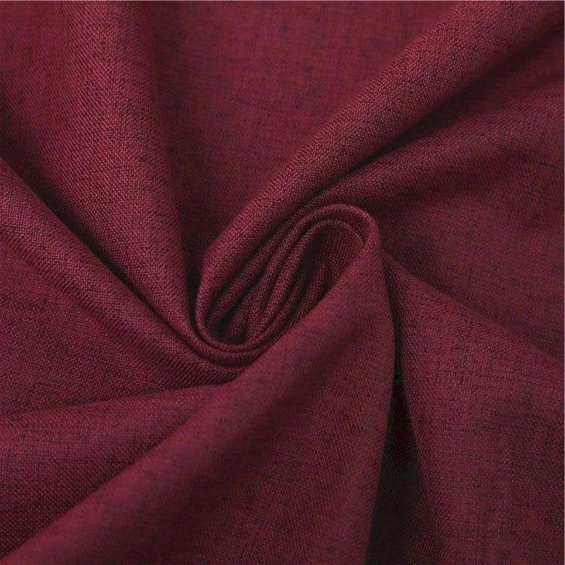 Image d'un tissu rouge bordeaux idéal pour la confection de vêtements et accessoires. Parfait pour des projets de couture chic et élégant.