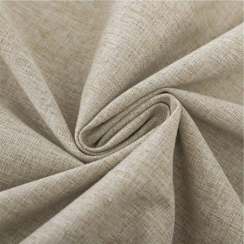 Image d'un tissu beige avec une texture élégante, idéale pour la décoration intérieure, les projets de couture, ou la fabrication de vêtements. Ce textile polyvalent offre une finition soignée et s'adapte parfaitement à divers styles d'intérieur.