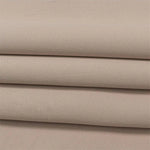 Image montrant un assortiment de tissu de couleur beige, parfait pour la confection de vêtements et d'accessoires de mode. Idéal pour les créateurs à la recherche de teintes neutres et élégantes, ce tissu se distingue par sa polyvalence et sa capacité à s'adapter à divers projets de couture.
