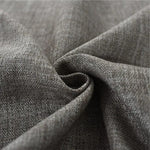 Texte alternatif SEO : "Tissu de rideau en lin gris foncé, élégant et moderne pour la décoration intérieure. Texture douce et résistante, idéale pour filtrer la lumière et ajouter une touche sophistiquée à votre maison."