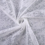 Image d'un tissu délicat aux motifs élégants et complexes, idéal pour la confection de vêtements raffinés ou de décorations intérieures uniques. Ce matériau sophistique est parfait pour les créations de mode, offrant une touche de charme et de style intemporel à toute réalisation.
