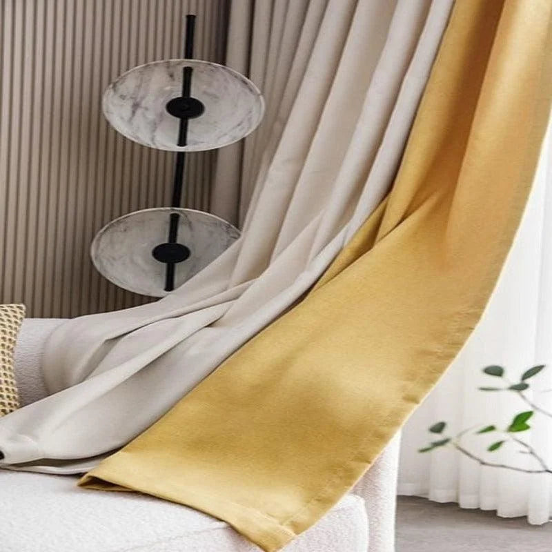 Rideaux élégants en teintes crème et jaune, parfaits pour illuminer et moderniser un salon. Ces rideaux ajoutent une touche sophistiquée à tout intérieur, idéals pour créer une atmosphère chaleureuse et accueillante. Accessoire de décoration incontournable pour habiller vos fenêtres avec raffinement.