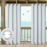 Rideaux élégants pour terrasse avec œillets, offrant une vue imprenable sur l'océan. Idéal pour ajouter une touche chic et moderne à votre espace extérieur tout en profitant de la brise marine. Parfaits pour créer un espace détente sur votre balcon.