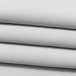 Empilement de textiles blancs, idéal pour la confection et la décoration intérieure, utilisé dans la création de divers articles ménagers et accessoires créatifs haut de gamme.