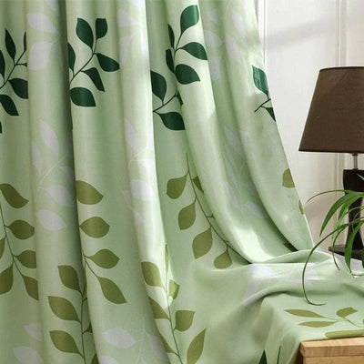 Rideau vert pastel avec motif de feuilles, idéal pour ajouter une touche de nature et de fraîcheur à votre intérieur. Ce rideau élégant est parfait pour un salon, une chambre ou tout autre espace de vie, offrant une ambiance apaisante et moderne. Son design végétal s'intègre facilement dans divers styles de décoration. Luminosité et intimité garanties.
