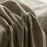 Rideau en lin texturé beige élégant et moderne, idéal pour la décoration intérieure. Tissu de haute qualité offrant une ambiance chaleureuse et sophistiquée dans le salon ou la chambre à coucher. Accessoire de maison esthétique et fonctionnel.