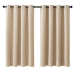 Paire de rideaux beiges avec œillets métalliques pour tringle, parfaits pour ajouter une touche élégante et moderne à n'importe quelle pièce. Design intemporel idéal pour salon ou chambre, offrant intimité et contrôle de la lumière.