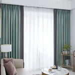 Rideaux élégants verts pour salon moderne, offrant un mélange de design contemporain et d'intimité. Ces rideaux longs sont parfaits pour habiller les fenêtres tout en ajoutant une touche de sophistication à votre décoration intérieure. Combinez fonctionnalité et esthétique pour un espace de vie accueillant et lumineux.