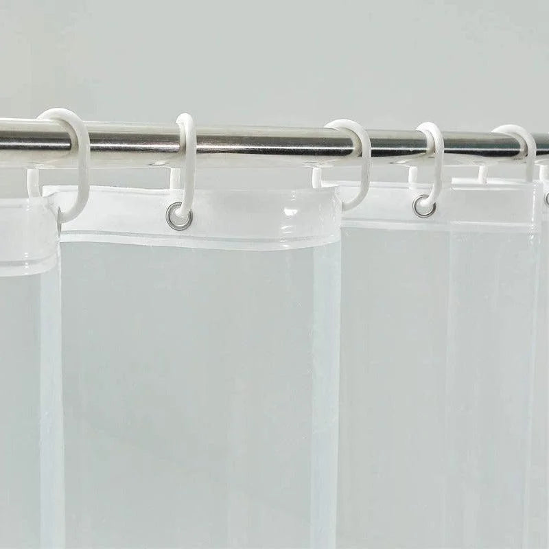 Rideau de douche translucide avec œillets robustes, idéal pour salle de bain moderne, installation facile sur barre de douche, design épuré et fonctionnel, préserve l'intimité tout en laissant passer la lumière. Parfait pour une décoration contemporaine.
