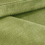 Tissu vert doux et élégant pour ameublement, idéal pour canapé ou fauteuil, apportant une touche de fraîcheur et de modernité à votre intérieur.