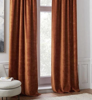 Rideaux élégants couleur terracotta pour salon moderne, ajoutant chaleur et sophistication à votre décoration intérieure. Ideal pour filtrer la lumière et créer une ambiance chaleureuse. Accessoire de maison parfait pour un espace accueillant et stylé.