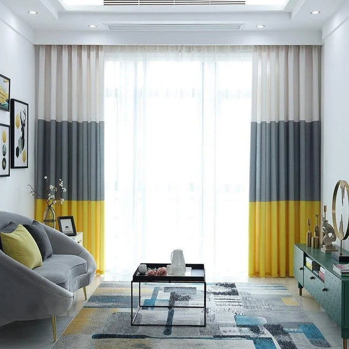 Rideaux modernes bicolores gris et jaune pour un salon tendance, apportant une touche lumineuse et élégante à votre intérieur. Parfaits pour compléter une décoration contemporaine et ajouter une ambiance chaleureuse.