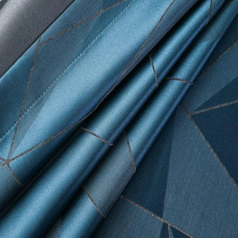Tissu bleu avec motif géométrique élégant, idéal pour la décoration intérieure raffinée. Design contemporain et harmonieux, parfait pour un style moderne et chic.