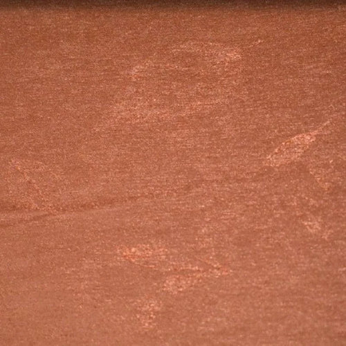 Image d'un tissu uni brun chaud, idéal pour la décoration intérieure ou la création de vêtements sophistiqués. Ce textile se distingue par sa teinte earthy et sa texture douce, parfaite pour apporter chaleur et élégance à vos projets de couture et de décoration.
