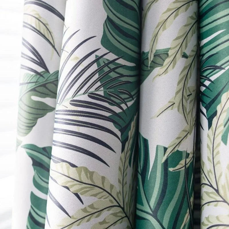 Rideau avec motif de feuilles tropicales vertes, idéal pour une décoration intérieure inspirée de la nature. Parfait pour ajouter une touche exotique et rafraîchissante à votre salon ou chambre à coucher.