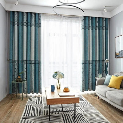 Rideaux modernes bleu et gris pour salon, parfaits pour ajouter une touche d'élégance à votre décoration intérieure. Idéal pour harmoniser le style contemporain de votre pièce avec des éléments colorés.