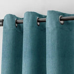 Rideau élégant bleu turquoise avec œillets métalliques, parfait pour ajouter une touche moderne à votre décoration intérieure. Adapté à divers styles de maison, ce rideau offre un moyen simple et efficace de contrôler la lumière et d'améliorer l'intimité de votre espace de vie.