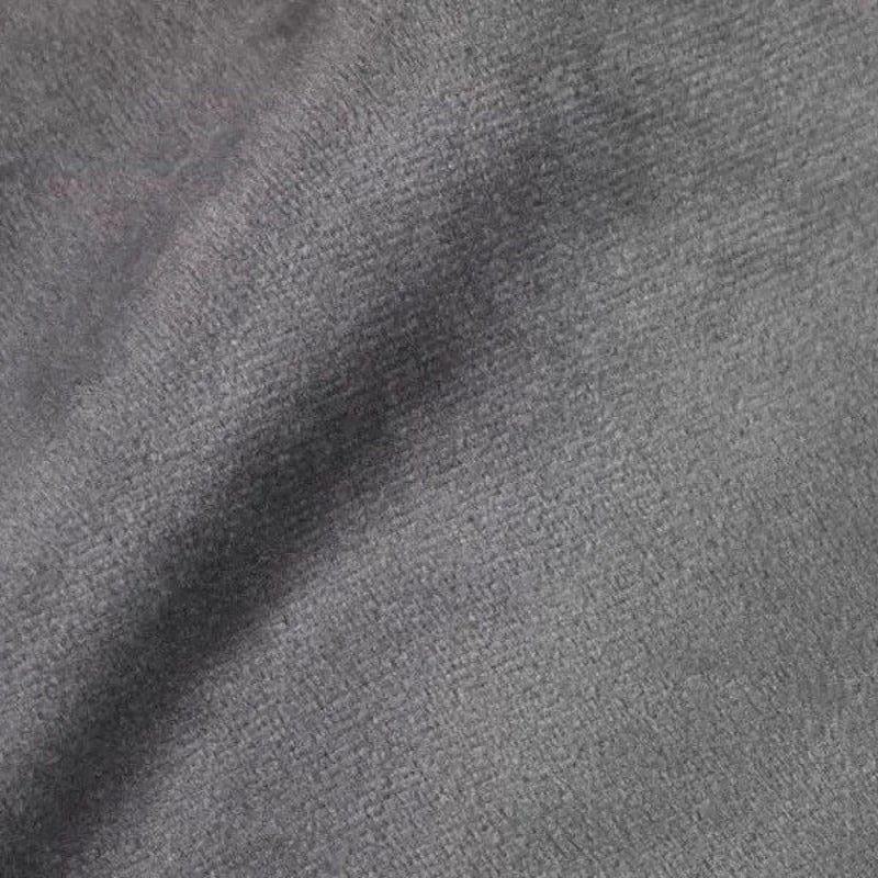 Tissu gris élégant, parfait pour la confection de vêtements chics et intemporels, offrant un style moderne et raffiné.