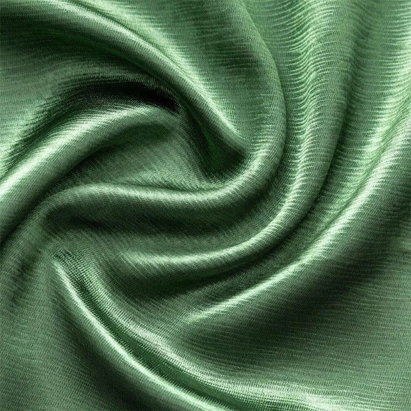 Rideau vert élégant pour décoration intérieure, ajoutant une touche de sophistication et de fraîcheur à votre espace, idéal pour salon ou chambre à coucher.