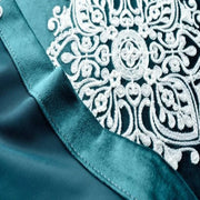 rideau bleu foncé broderie florale velours élégant tringle motifs vases transparent