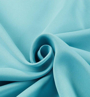 Image de tissu bleu clair élégant avec un pli central, idéal pour la décoration intérieure ou la confection de vêtements modernes. Ce tissu offre une vibrance de couleur et un style intemporel pour divers projets créatifs. Parfait pour les utilisateurs cherchant à ajouter une touche de fraîcheur bleu azur à leur design.