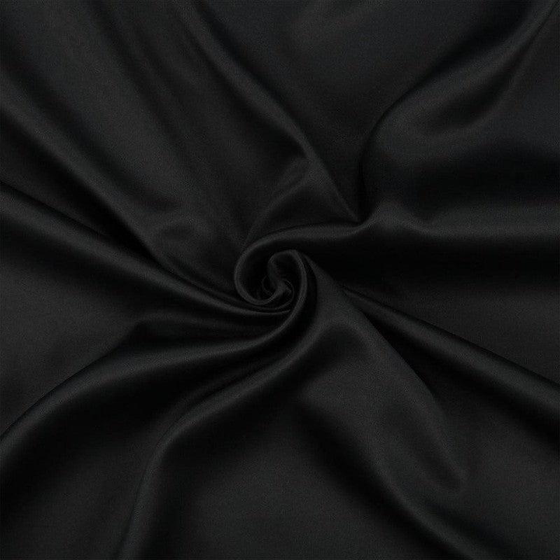 Tissu noir élégant pour décoration et confection, idéal pour projets de couture créatifs et création de vêtements tendance. Sa couleur intemporelle s'adapte parfaitement à tout style. Parfait pour designers et amateurs de mode recherchant une touche sophistiquée.