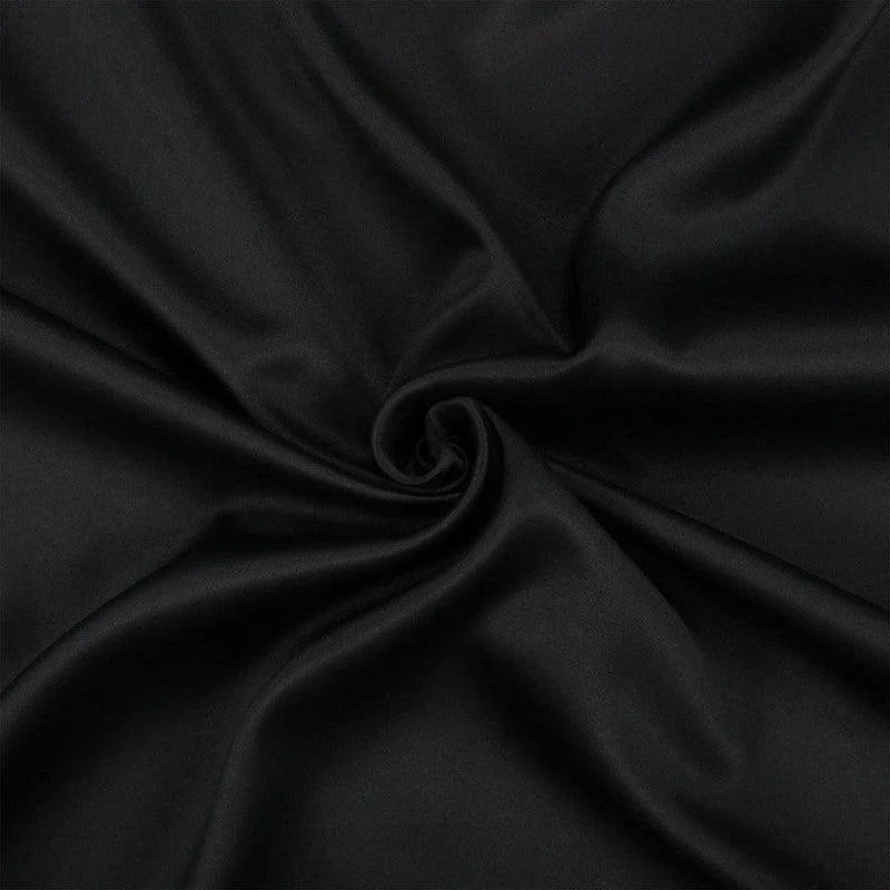 Tissu noir élégant pour décoration et confection, idéal pour projets de couture créatifs et création de vêtements tendance. Sa couleur intemporelle s'adapte parfaitement à tout style. Parfait pour designers et amateurs de mode recherchant une touche sophistiquée.