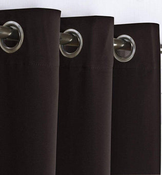 Rideaux occultants noirs avec œillets pour tringles, design moderne idéal pour chambre ou salon, protection optimale contre la lumière, isolation thermique et acoustique, décoration élégante et pratique pour intérieur contemporain.