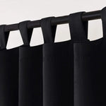 Rideau noir élégant avec pattes, idéal pour une décoration moderne et épurée, offrant une solution d'habillage de fenêtre pratique et esthétique pour votre intérieur. Parfait pour un salon, une chambre ou un bureau.