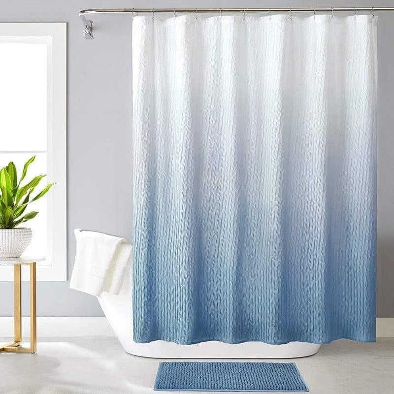 Rideau de douche dégradé bleu pour salle de bain moderne, ajout élégant à la décoration intérieure, protection efficace contre les éclaboussures, accessoire harmonieux avec tapis de bain assorti, idéal pour créer une ambiance apaisante et contemporaine.