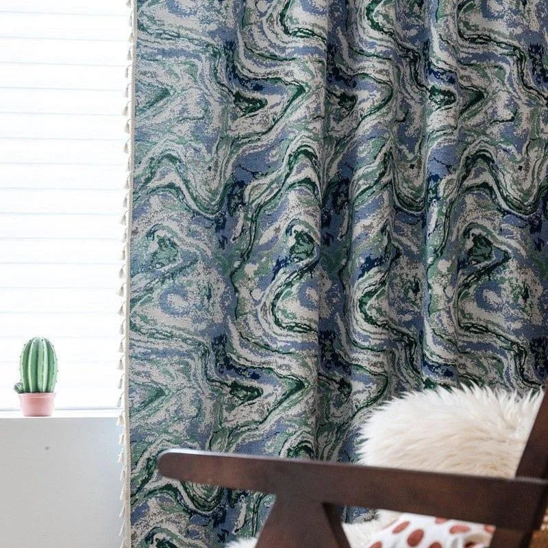 Rideaux design avec motif marbré bleu et vert, parfaits pour ajouter une touche artistique à votre intérieur. Complétez votre décoration avec ce rideau élégant, idéal pour les salons modernes ou les espaces de détente. Découvrez comment ce motif unique peut transformer l'ambiance de votre pièce.