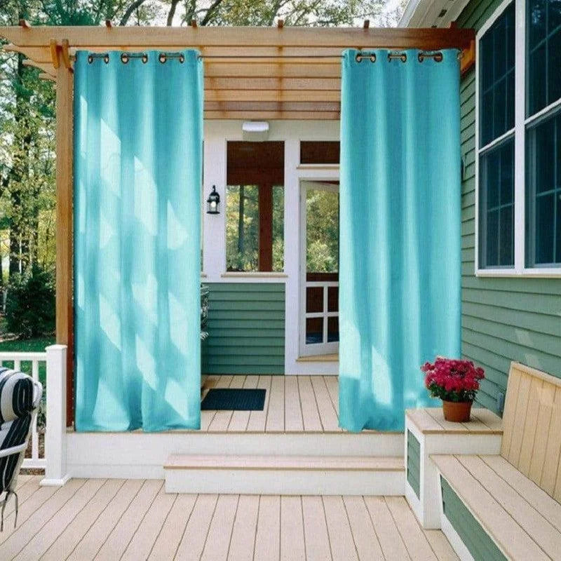 Rideaux turquoise pour terrasse extérieure, ajoutant une touche de couleur et d'intimité à votre espace extérieur. Idéals pour une pergola, ces rideaux offrent une ambiance moderne et chaleureuse à votre maison. Parfait pour créer un espace de détente ombragé sur votre terrasse.