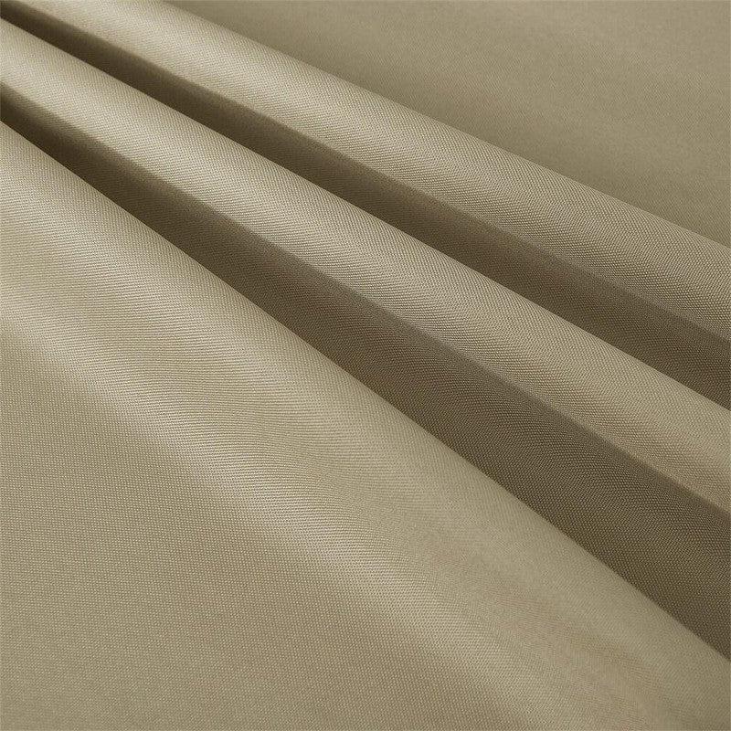 Produit textile beige avec texture en relief, adapté pour confection et décoration intérieure, offrant une apparence élégante et moderne.