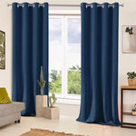 Rideaux bleus élégants pour salon moderne, offrant une touche de couleur à la décoration intérieure, avec anneaux argentés pour une suspension facile. Ils sont parfaits pour habiller les fenêtres et créer une ambiance accueillante et chaleureuse dans votre maison.