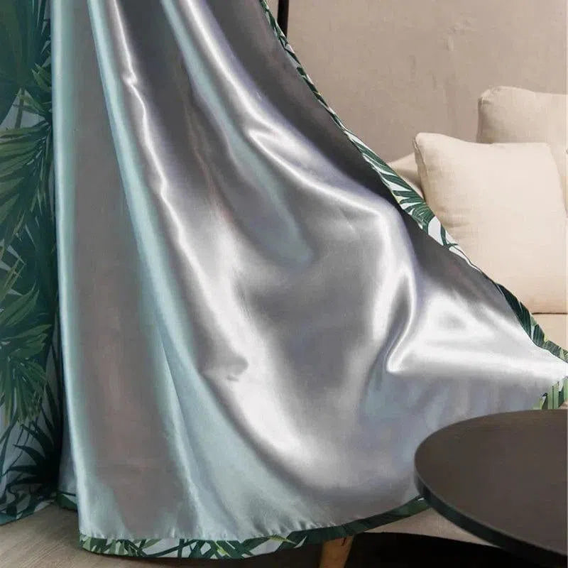 Rideau élégant avec motif de feuilles tropicales, idéal pour ajouter une touche de modernité et de fraîcheur à votre salon ou chambre à coucher. Ce modèle de rideau est parfait pour créer une ambiance chaleureuse et accueillante tout en préservant votre intimité. Son design raffiné s'intègre facilement dans tout type de décoration intérieure. Accessoire incontournable pour transformer votre espace de vie.
