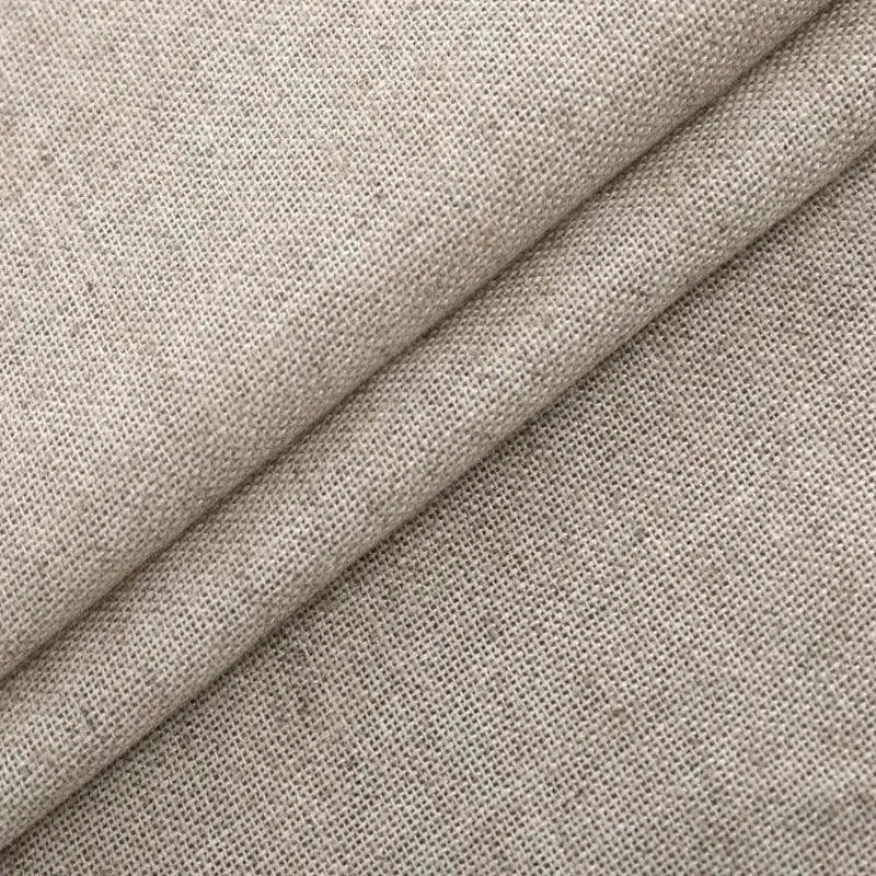 Tissu beige naturel plié, idéal pour confection couture, ameublement et décoration intérieure. Texture légère et aérée. Parfait pour créations artisanales et projets DIY.