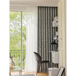 Rideaux modernes gris pour salon, accentuant le design intérieur avec élégance. Disposez ces rideaux élégants devant une grande baie vitrée pour filtrer doucement la lumière naturelle tout en préservant votre intimité. Idéal pour un espace contemporain ou une décoration minimaliste. Accessoire parfait pour rehausser l'esthétique de votre salon ou bureau. Transformez votre pièce avec style et fonctionnalité.
