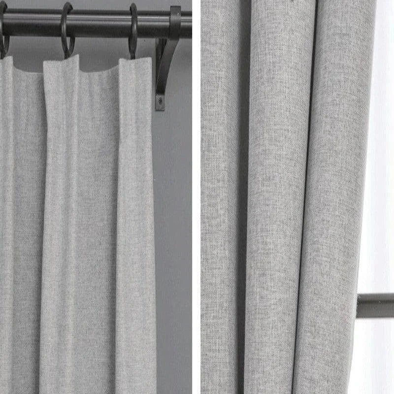Rideau gris élégant avec crochets en métal, idéal pour une décoration intérieure moderne et épurée. Parfait pour filtrer la lumière tout en ajoutant une touche de sophistication à votre salon ou chambre à coucher. Disponible pour différentes tailles de fenêtres.