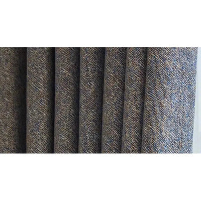 Image montrant un rideau moderne avec un motif texturé gris foncé, idéal pour ajouter une touche élégante et contemporaine à tout intérieur. Convient parfaitement pour le salon ou la chambre à coucher, apportant une ambiance chaleureuse et sophistiquée.