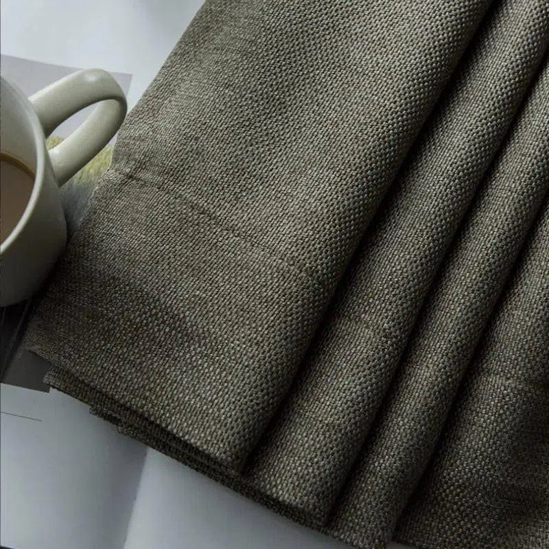 Tissu style naturel, couleur marron, idéal pour décoration intérieure. Parfait pour rideaux ou nappes. Accessoire moderne et élégant au design raffiné.