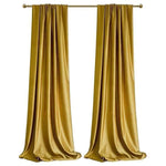 Rideaux élégants dorés pour salon, design moderne et chic, parfaits pour ajouter une touche de luxe et de sophistication à votre intérieur. Idéal pour l'aménagement de votre espace de vie avec style et élégance, offrant une ambiance chaleureuse et accueillante.