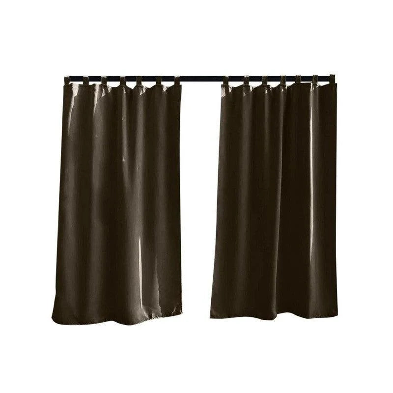 Paire de rideaux marron obscur pour décoration intérieure moderne, avec système de fixation à œillets pour un accrochage facile. Parfaits pour un salon, une chambre ou un bureau, ces rideaux élégants ajoutent une touche de sophistication et de confort à votre espace, tout en permettant une gestion optimale de la lumière.