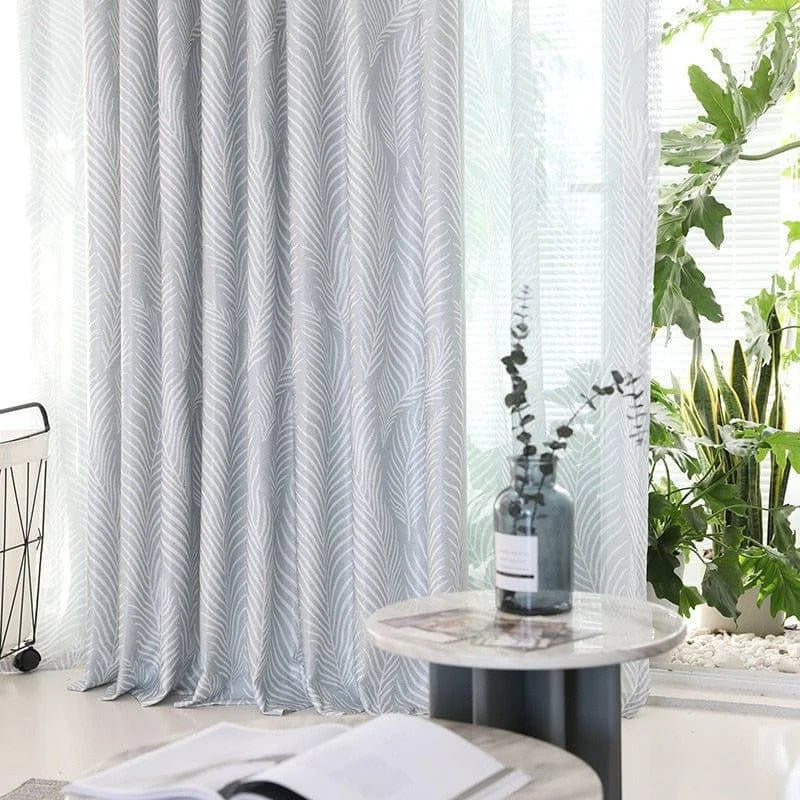 Rideau élégant avec motifs de feuilles, parfait pour ajouter une touche moderne et naturelle à votre intérieur, idéal pour le salon ou la chambre. Complément décoratif idéal pour créer une atmosphère apaisante et sophistiquée.