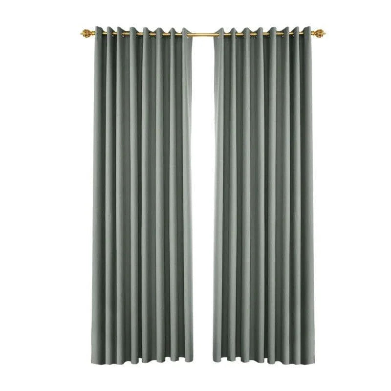 Rideaux élégants gris pour salon, dotés d'une tringle dorée décorative. Idéal pour ajouter une touche moderne et sophistiquée à votre intérieur tout en contrôlant la luminosité. Accessoire indispensable pour une décoration raffinée.