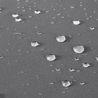Gouttelettes d'eau sur une surface imperméable grise, démontrant l'efficacité du produit dans la protection contre l'humidité. Adapté pour une utilisation en extérieur ou dans des conditions rendues difficiles par la pluie, ce produit offre une résistance exceptionnelle à l'eau, assurant une protection durable pour tous vos besoins. Idéal pour ceux recherchant une solution fiable et performante.