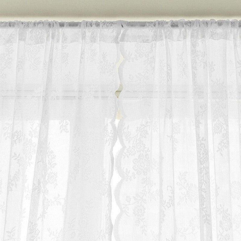 Rideau décoratif blanc avec motifs floraux délicats, idéal pour ajouter une touche élégante et lumineuse à votre intérieur. Ce modèle s'adapte facilement à tout type de fenêtre, offrant une ambiance chaleureuse et raffinée. Parfait pour le salon, la chambre ou la salle à manger, il transforme votre espace en un havre de paix.