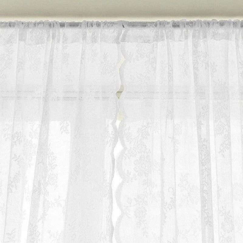 Rideau décoratif blanc avec motifs floraux délicats, idéal pour ajouter une touche élégante et lumineuse à votre intérieur. Ce modèle s'adapte facilement à tout type de fenêtre, offrant une ambiance chaleureuse et raffinée. Parfait pour le salon, la chambre ou la salle à manger, il transforme votre espace en un havre de paix.