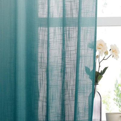 Rideau translucide bleu-vert élégant, idéal pour un salon moderne. Design à motifs géométriques apportant une touche sophistiquée. Filtre la lumière naturellement tout en préservant l'intimité. Parfait pour créer une ambiance apaisante dans n'importe quelle pièce de la maison.