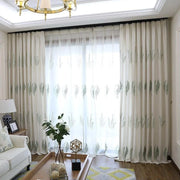 rideau semi transparent motif fougères moderne couleur beige clair vert tringle noire decoration intérieure