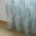 Rideau transparent avec motif d'arbres, idéal pour une décoration intérieure naturelle et élégante. Ce rideau offre une ambiance lumineuse tout en préservant l'intimité. Parfait pour salon, chambre ou salle à manger. Ajoutez une touche de nature à votre espace avec ce design raffiné et intemporel.